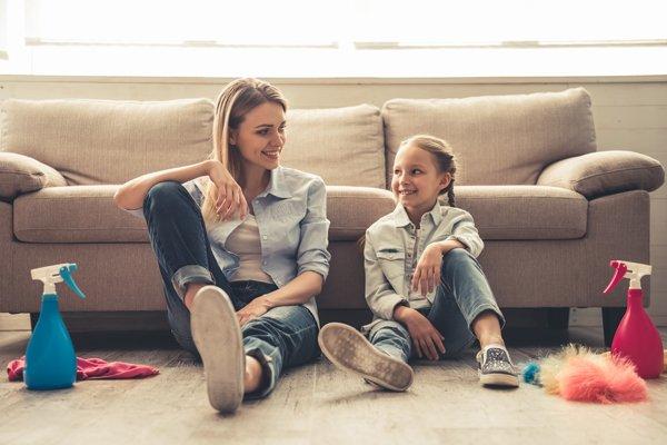 Mom and daughter cleaning Linoleum floors